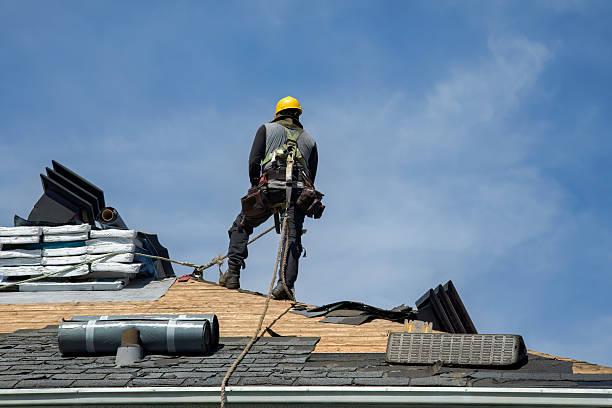 Professional Roof Replacement technician working in Butler, IN